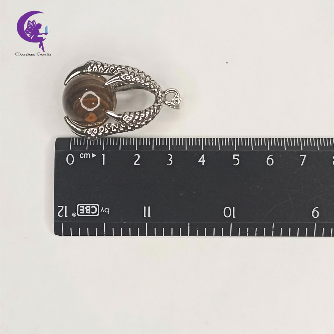 Falcon Grip Tiger’s Eye Pendant