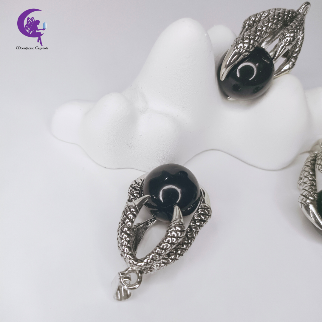Falcon Grip Black Obsidian Pendant
